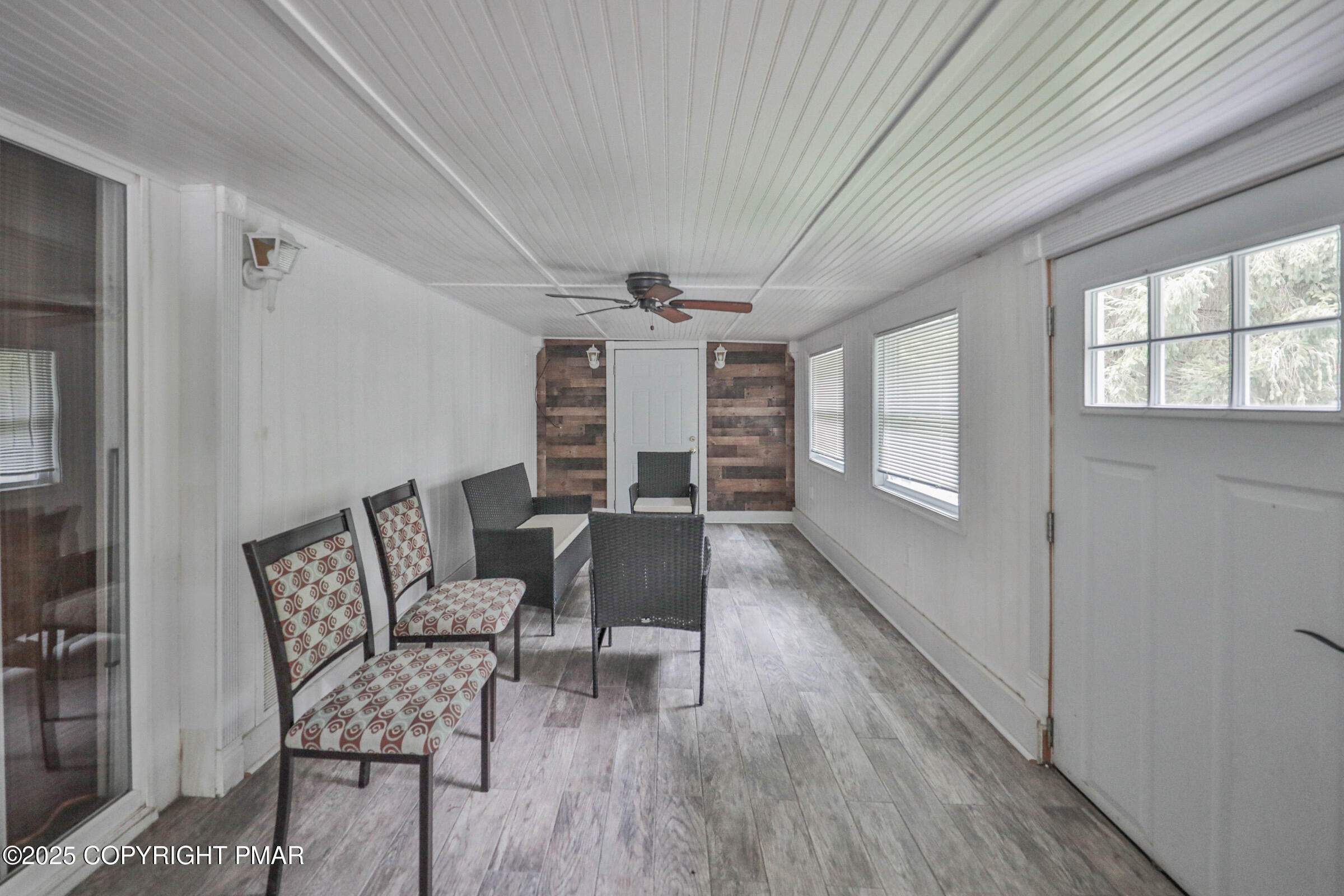 1094 Maple Lake Drive Bushkill, PA 18324 - Photo 63 of 81 a dining room with furniture and wooden floor