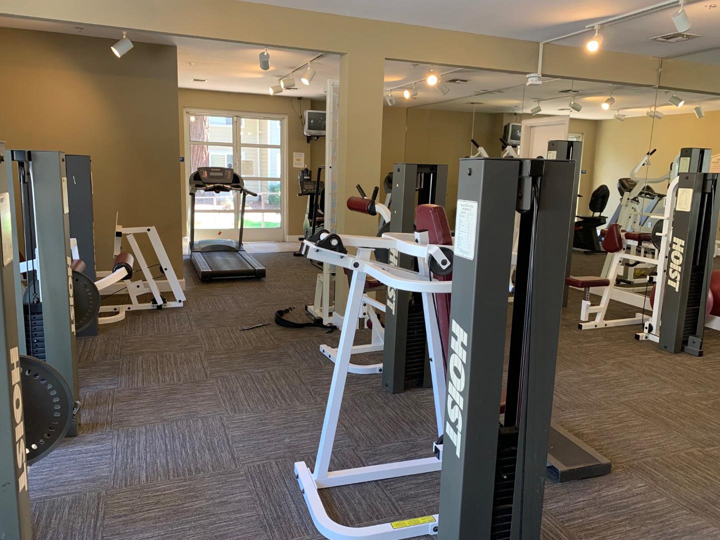 105 Reflections Drive, Unit 15 San Ramon, CA 94583 - Photo 15 of 42 a view of a room with gym equipment