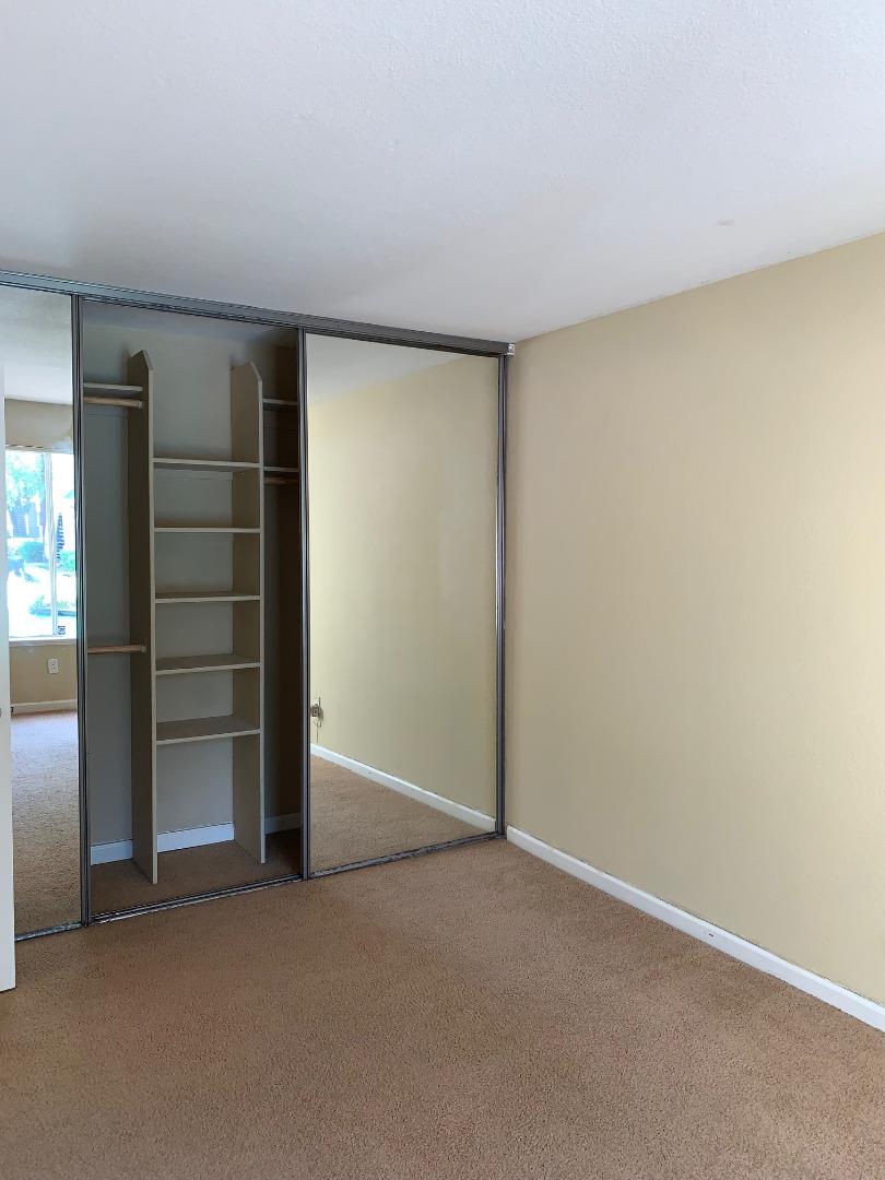105 Reflections Drive, Unit 15 San Ramon, CA 94583 - Photo 20 of 42 a view of an empty room with a closet