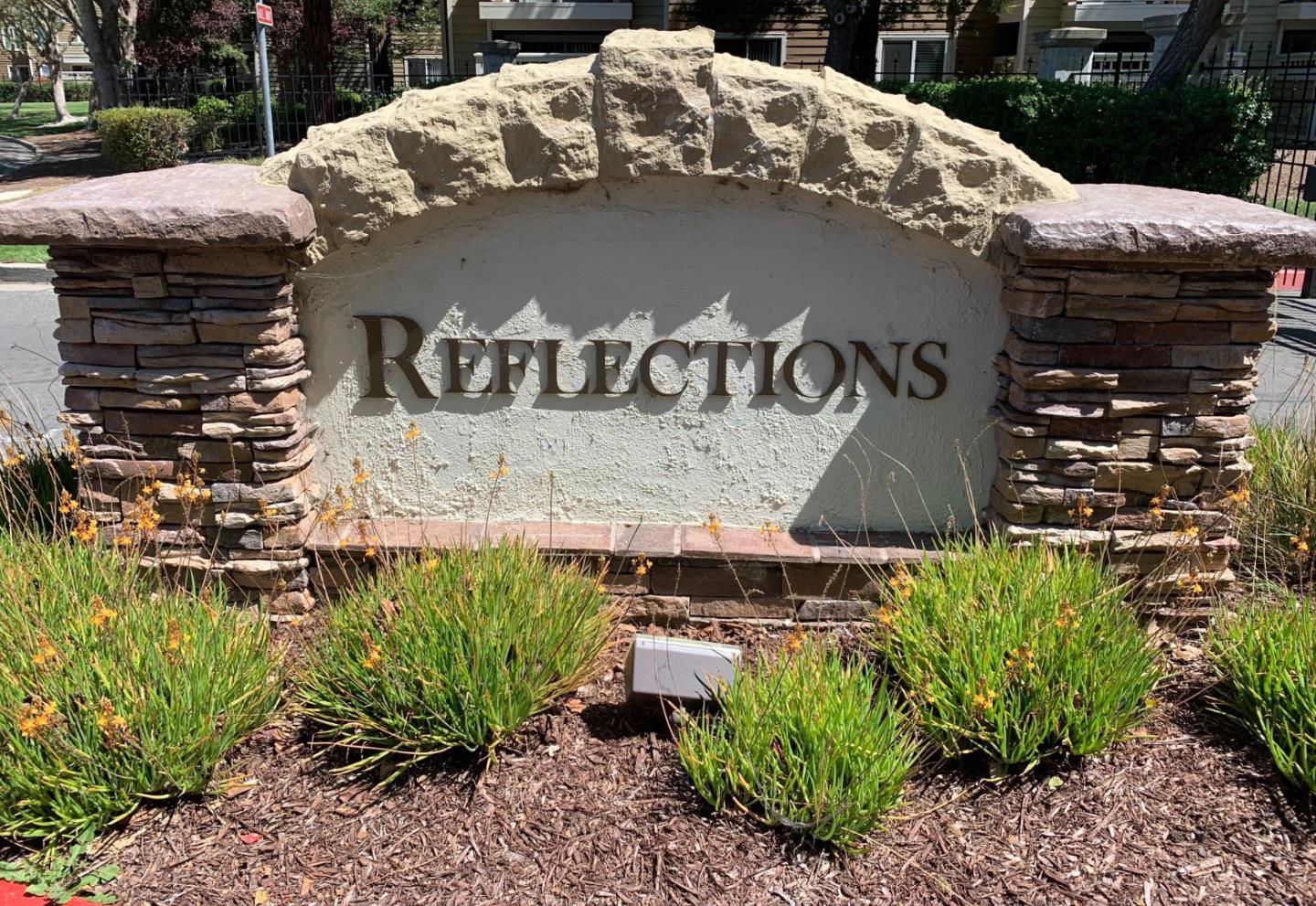 105 Reflections Drive, Unit 15 San Ramon, CA 94583 - Photo 2 of 42 a view of a house with a street