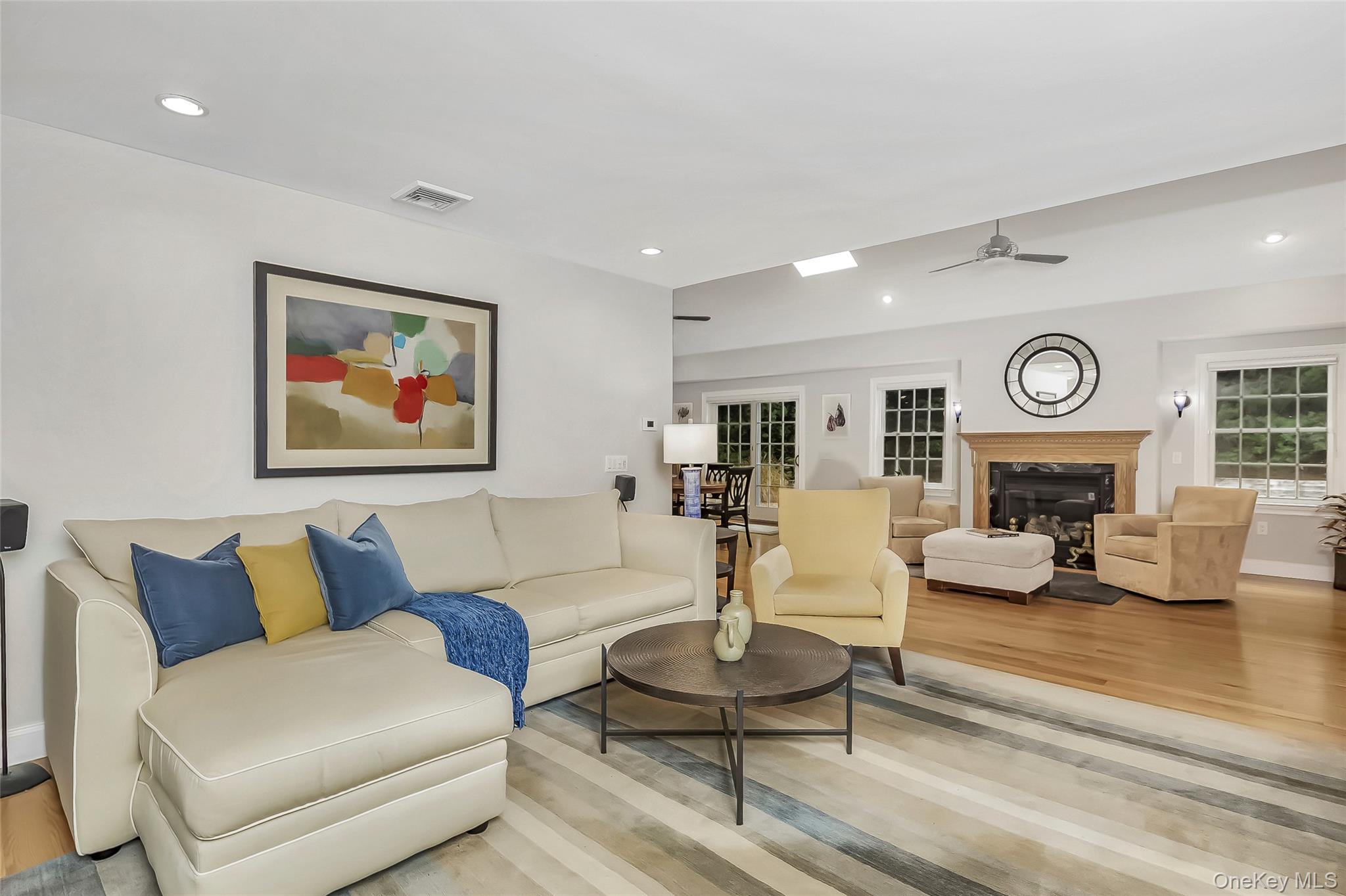3 Sally's Path East Hampton, NY 11937 - Photo 4 of 30 a living room with furniture and a fireplace