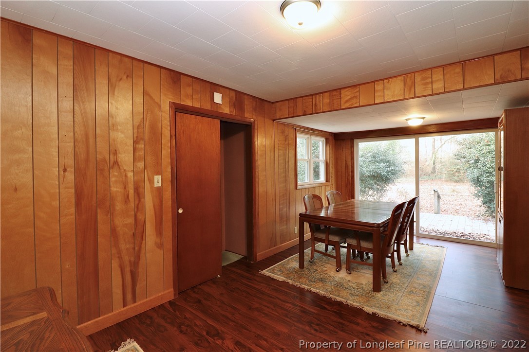 564 Shady Lane Road Carthage, NC 28327 - Photo 13 of 21 a view of a dining room with furniture window and wooden floor