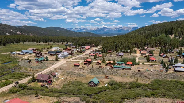 a view of swimming pool with outdoor seating