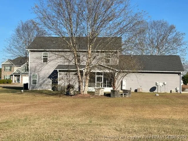 a view of a building with cars