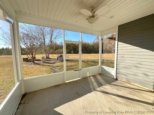a view of a living room and window