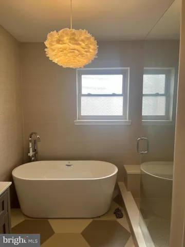 a bathroom with a sink and a bathtub