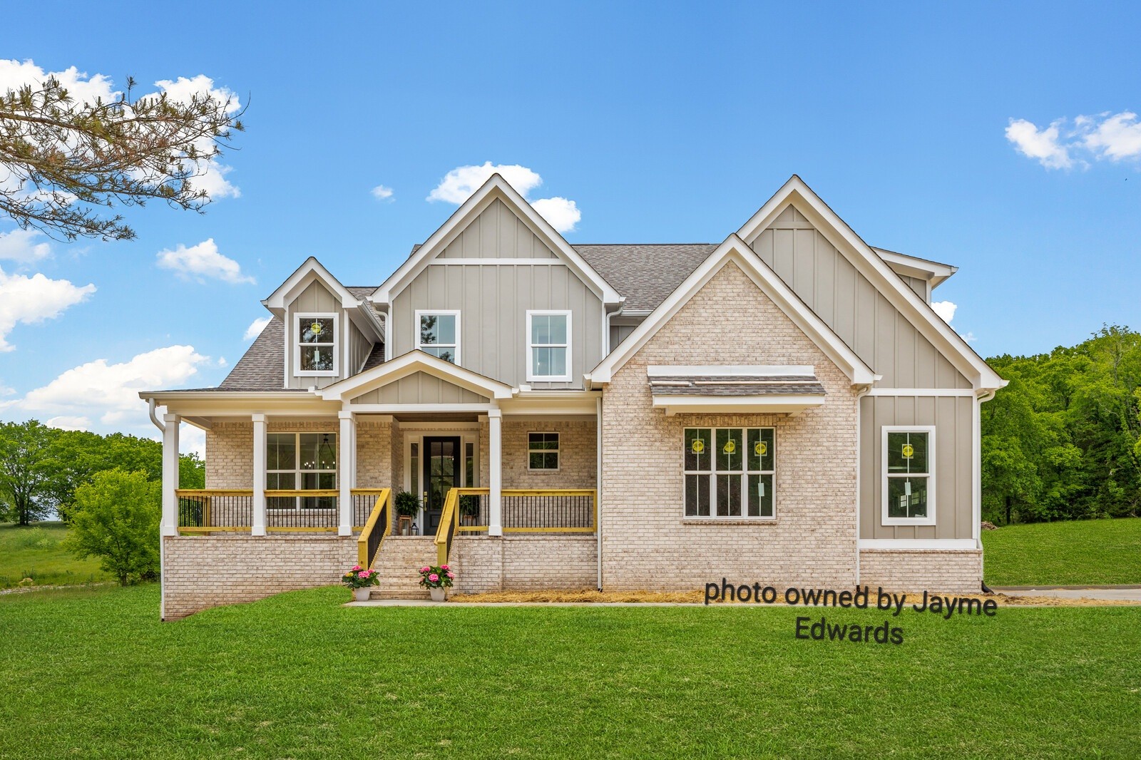 1235 Cliff Amos Road Spring Hill, TN 37174 - Photo 1 of 16 a front view of a house with a yard