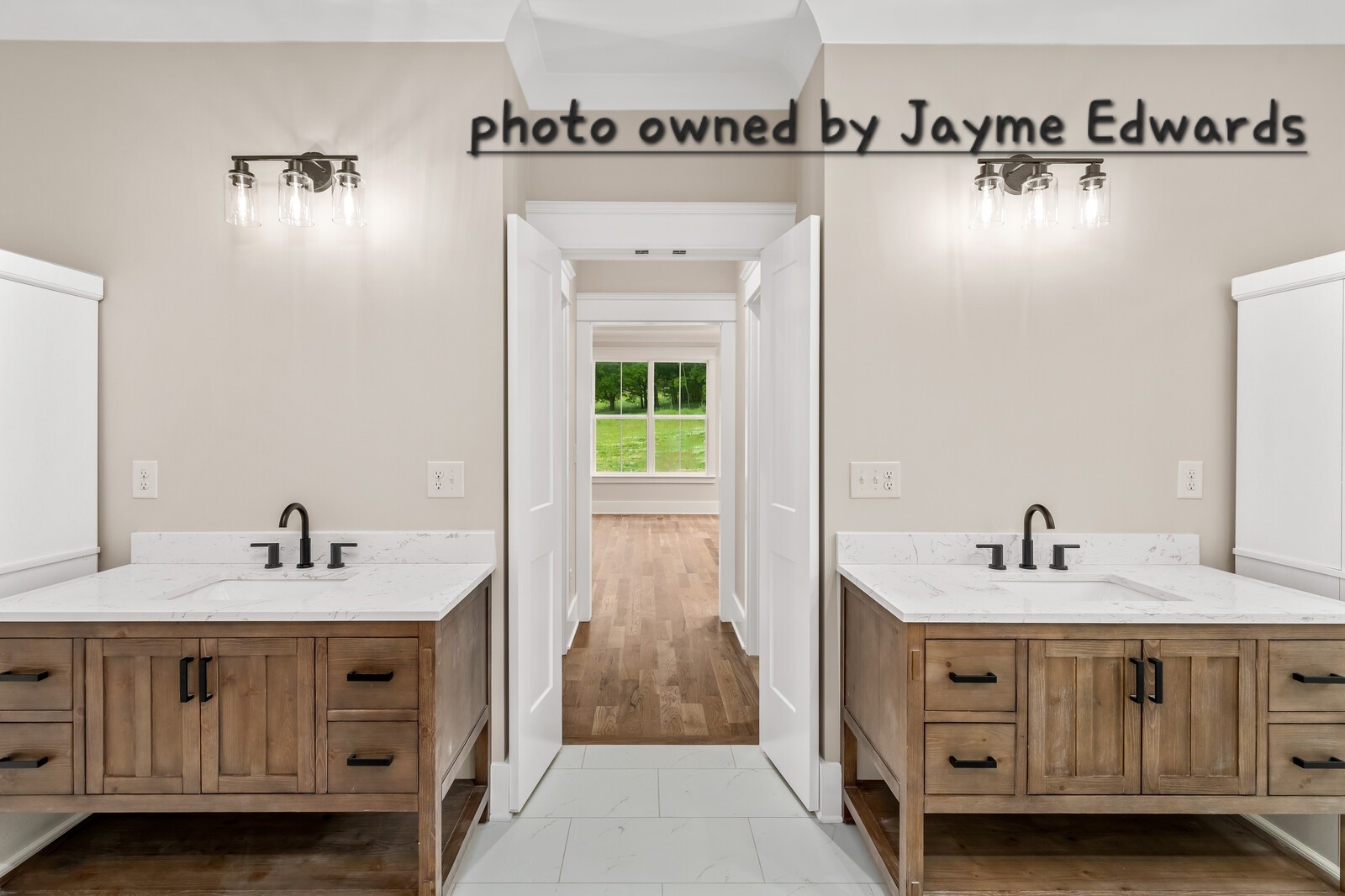 1235 Cliff Amos Road Spring Hill, TN 37174 - Photo 12 of 16 a bathroom with a double vanity sink and mirror