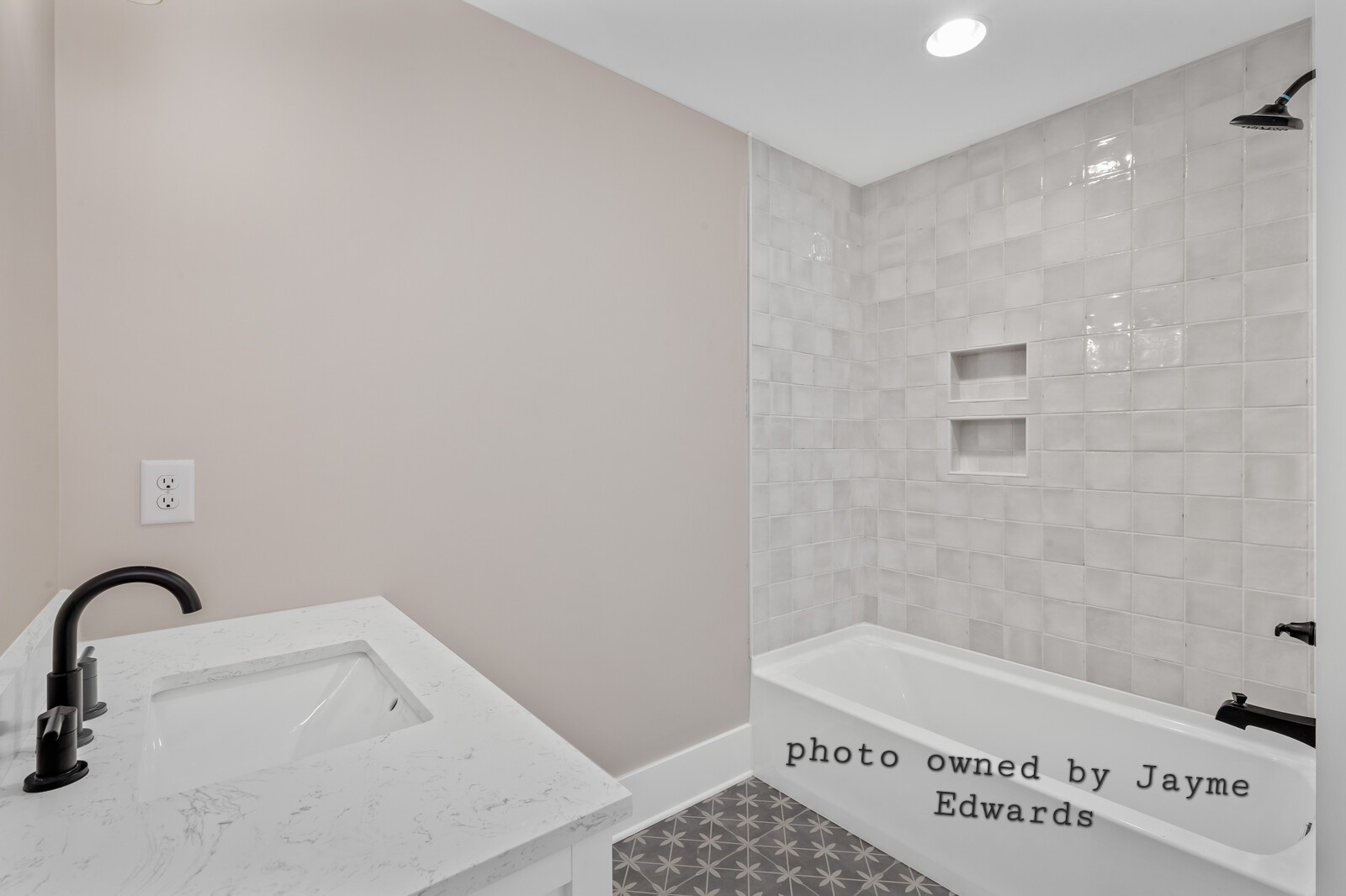 1235 Cliff Amos Road Spring Hill, TN 37174 - Photo 15 of 16 a bathroom with a bathtub and a sink