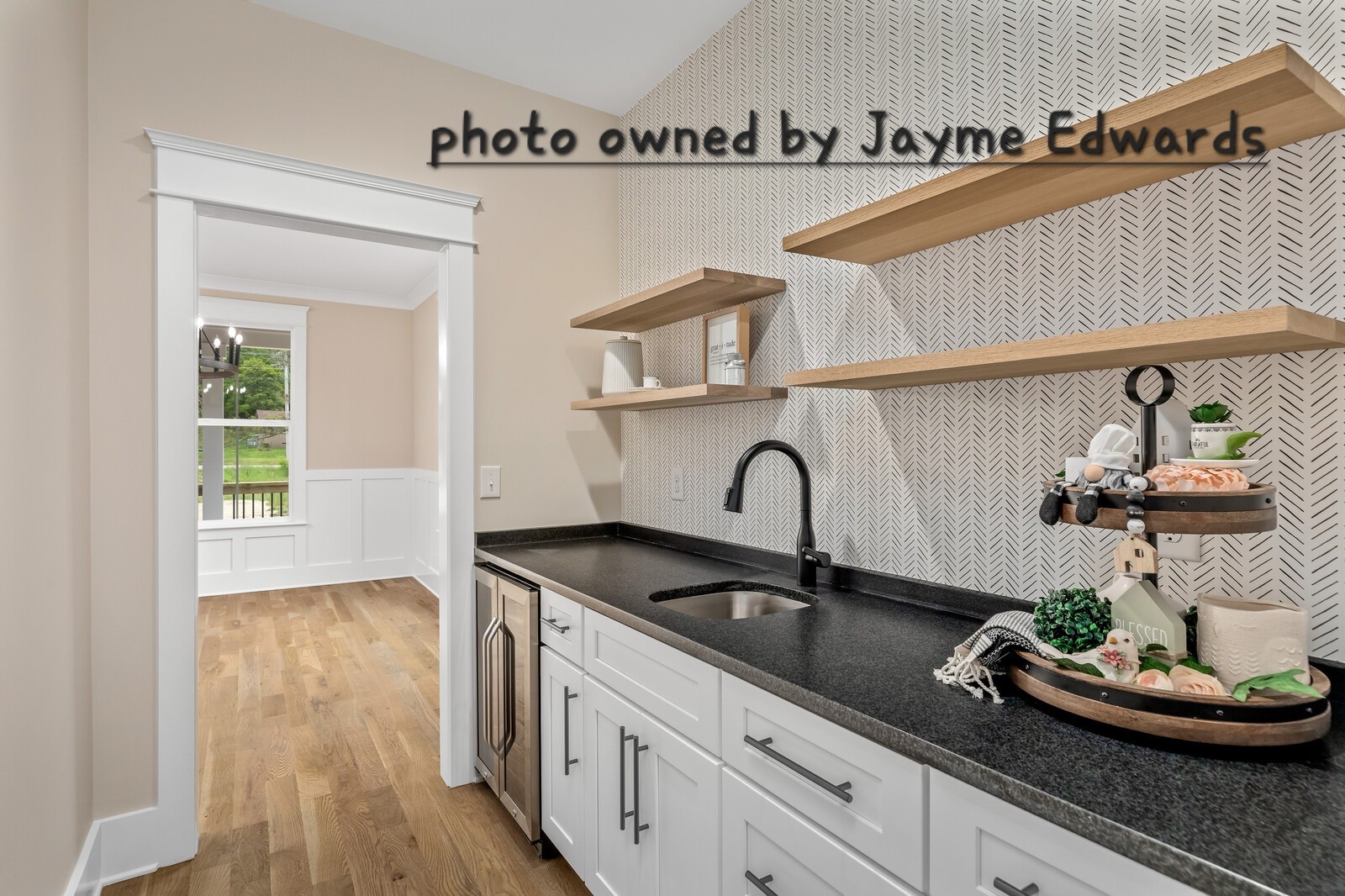 1235 Cliff Amos Road Spring Hill, TN 37174 - Photo 6 of 16 a kitchen with a sink and cabinets