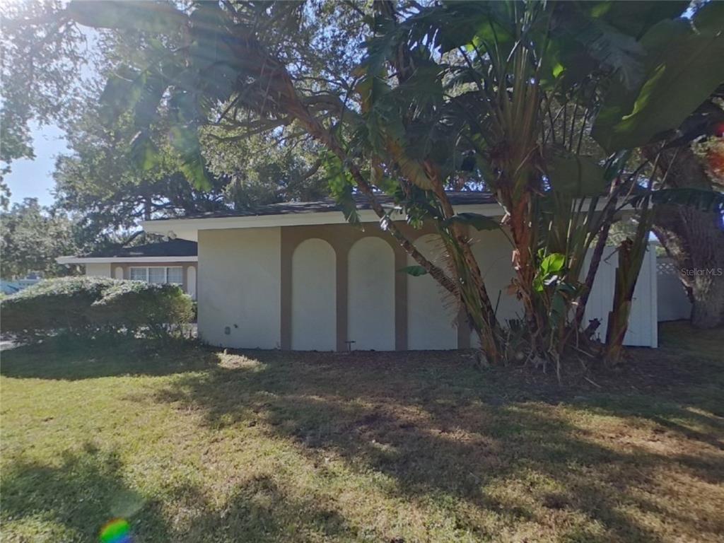 Undisclosed Address Clearwater, FL 33759 - Photo 1 of 1 a view of a yard with a tree