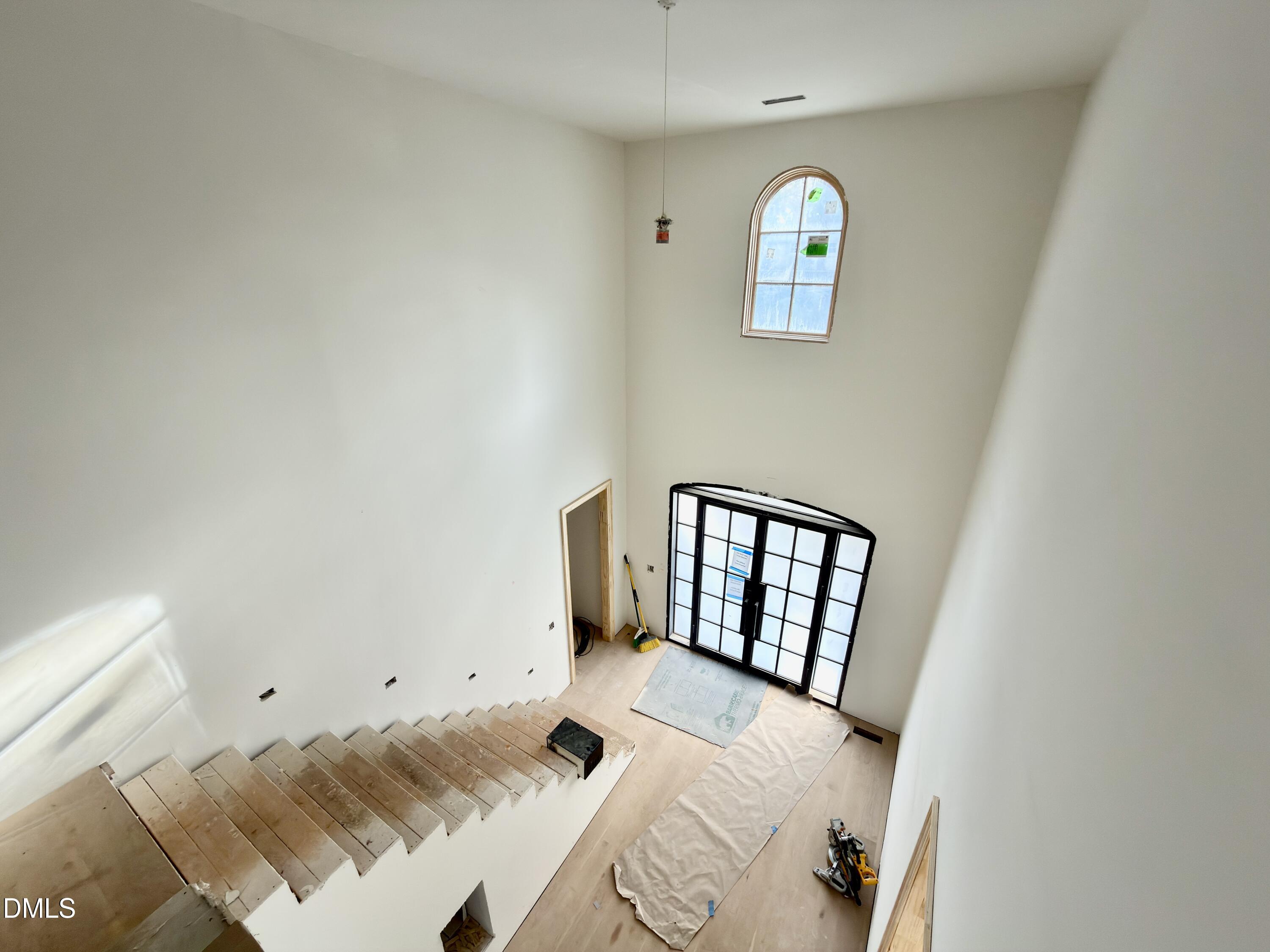 4801 Rampart Street Raleigh, NC 27609 - Photo 35 of 51 a bedroom with a bed and a window