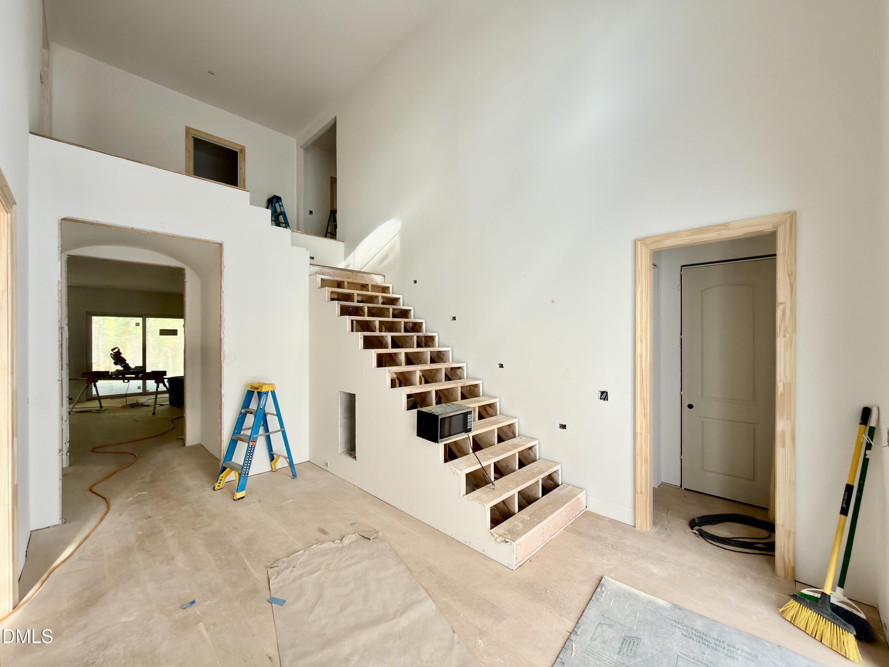 4801 Rampart Street Raleigh, NC 27609 - Photo 4 of 51 a view of livingroom with furniture and wooden floor