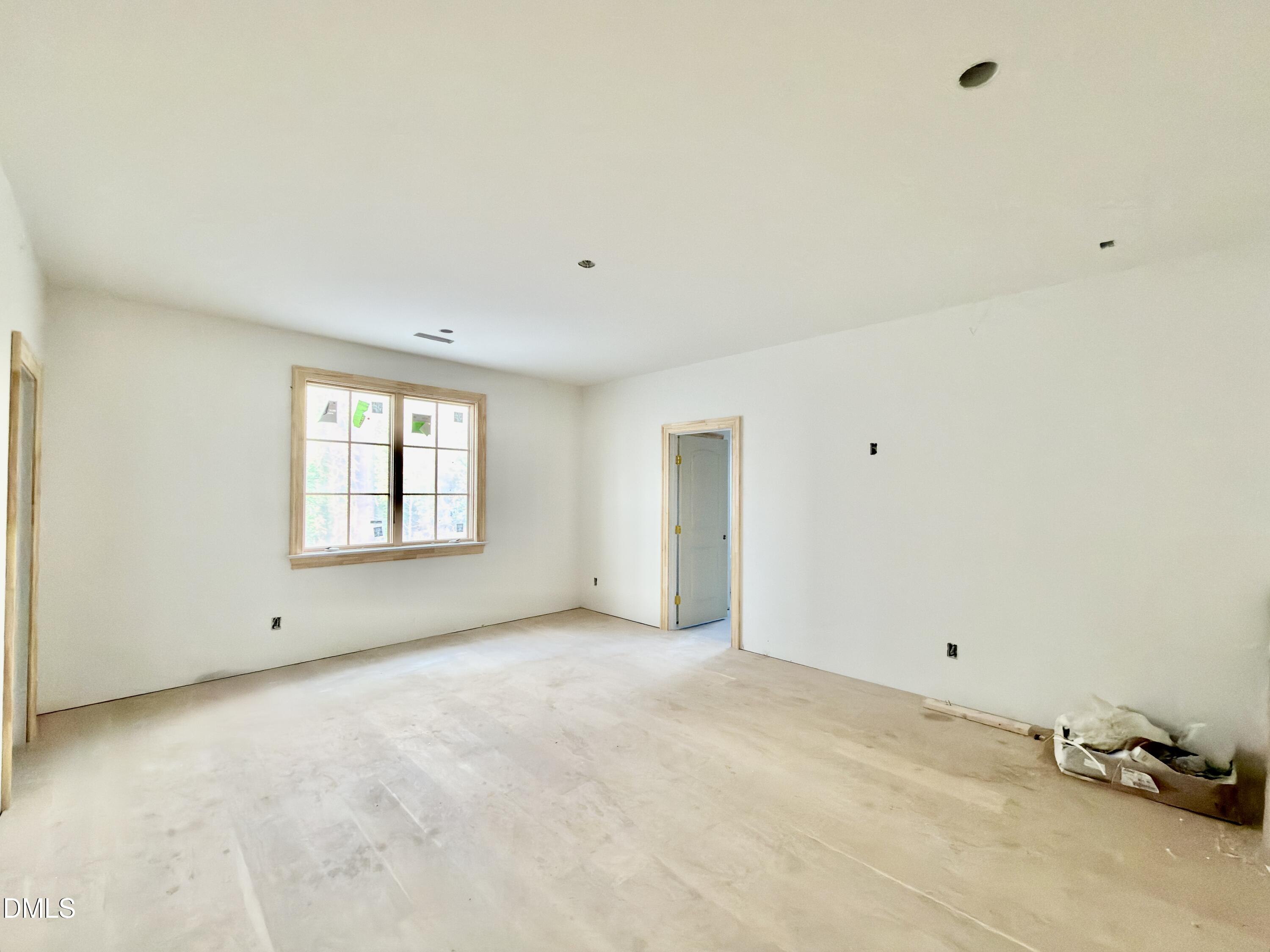 4801 Rampart Street Raleigh, NC 27609 - Photo 46 of 51 a view of an empty room with a window