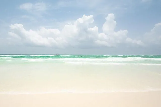 a view of a chairs and table in a patio