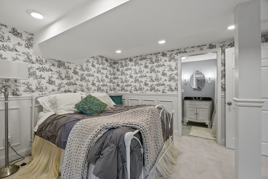 10 Sandy Cove Road Lunenburg, MA 01462 - Photo 36 of 43 a bed room with a bed and a television