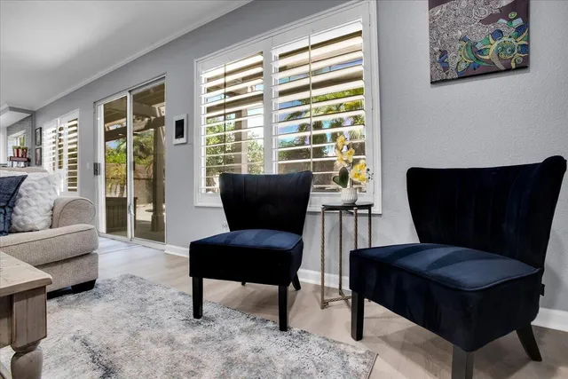 a view of kitchen with dining table and chairs