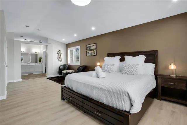 a view of a livingroom with furniture and windows