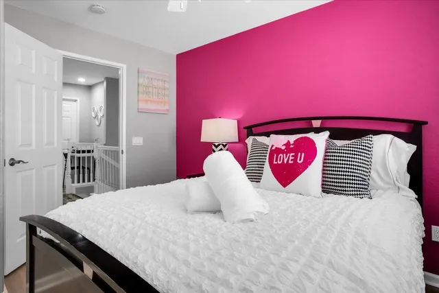 a view of an house with backyard swimming pool and sitting area