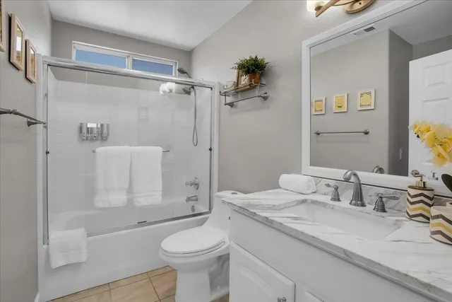 a swimming pool with outdoor seating and yard