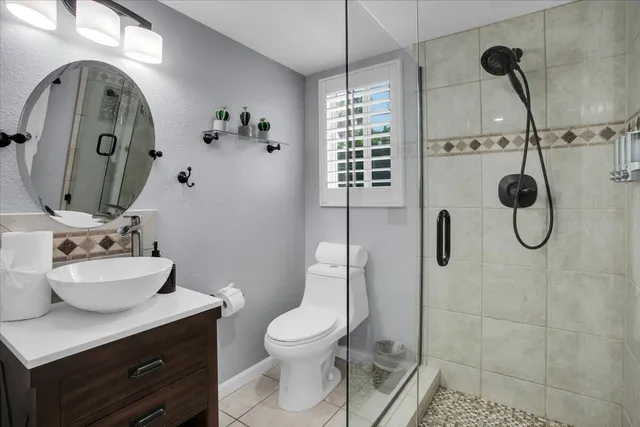 an aerial view of residential houses and outdoor space