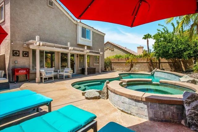 a view of a backyard with a garden