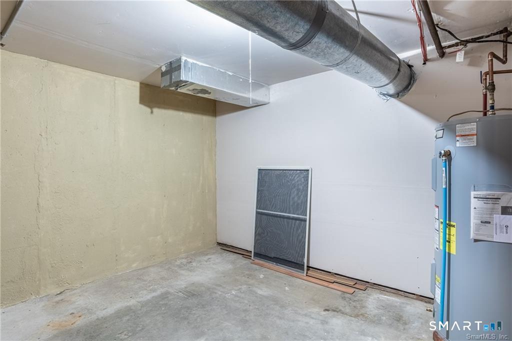 40 Village Walk, Unit 40 Wilton, CT 06897 - Photo 25 of 40 Private Storage Room, off garage, is approx 12' x 10"