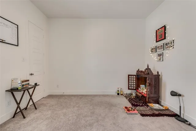 a room with furniture and gym equipment
