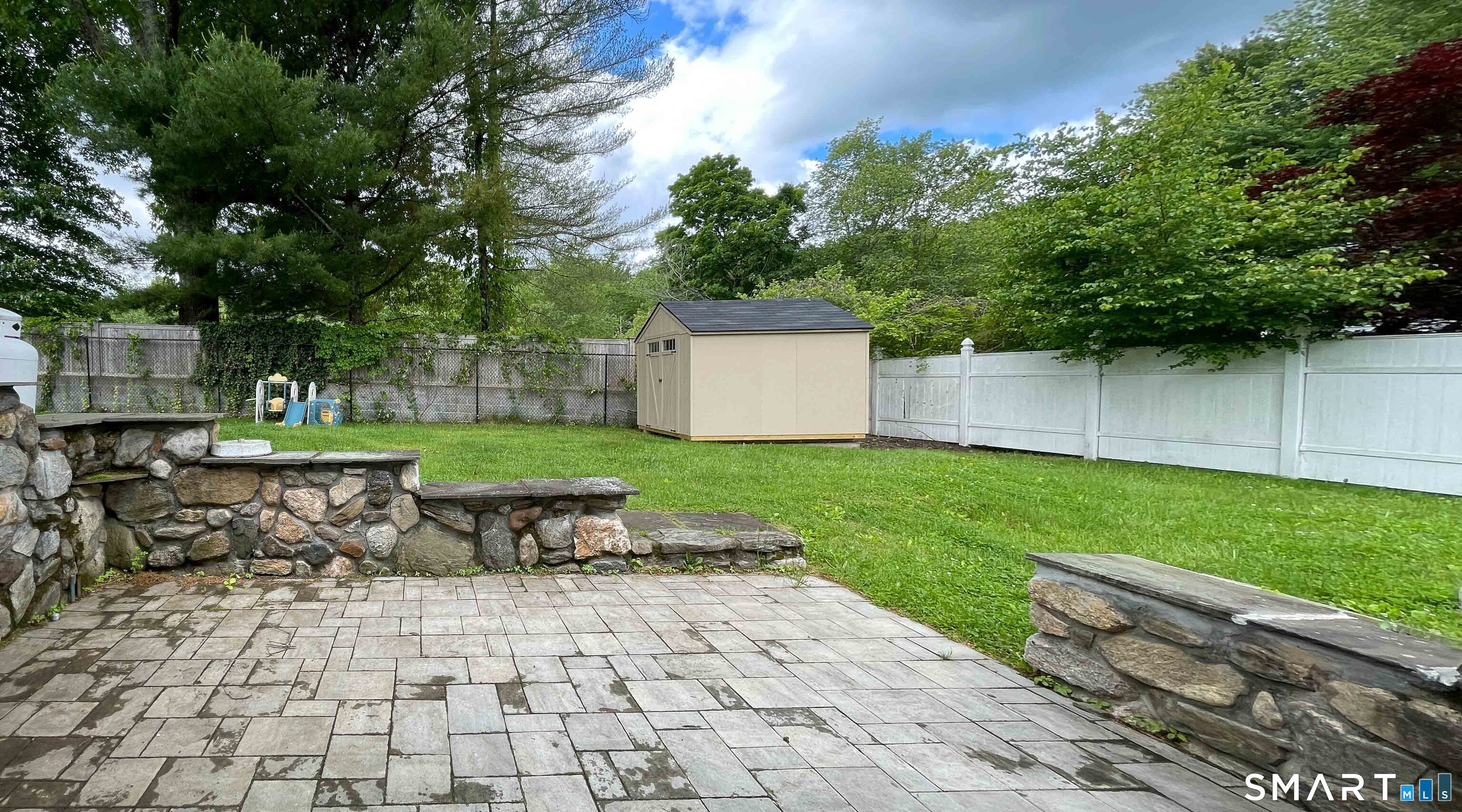 5 Sycamore Lane Brookfield, CT 06804 - Photo 24 of 25 Patio off lower level