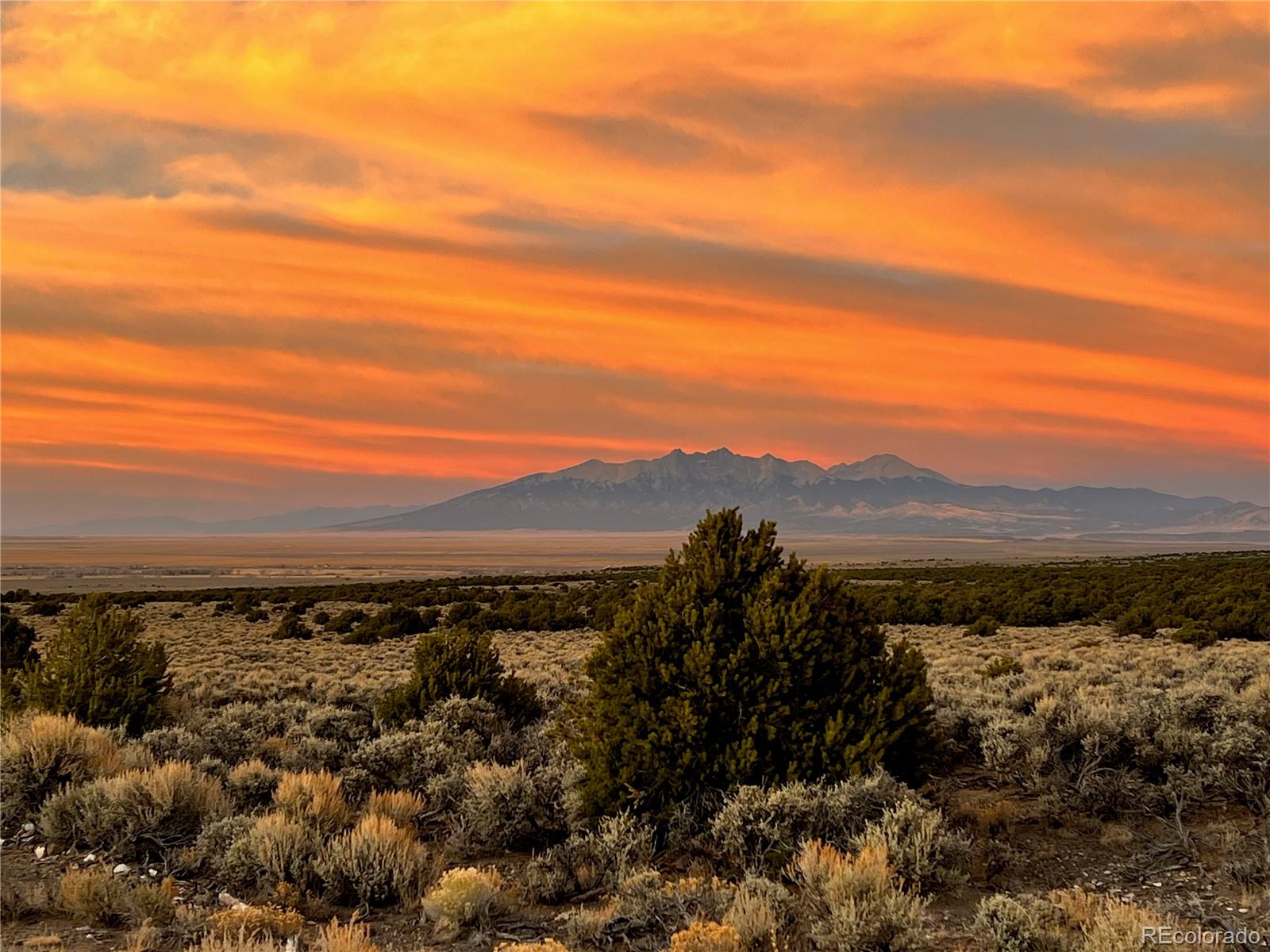 Power Line Drive San Luis, CO 81152 - Photo 3 of 6 a view of a large body of water and mountain