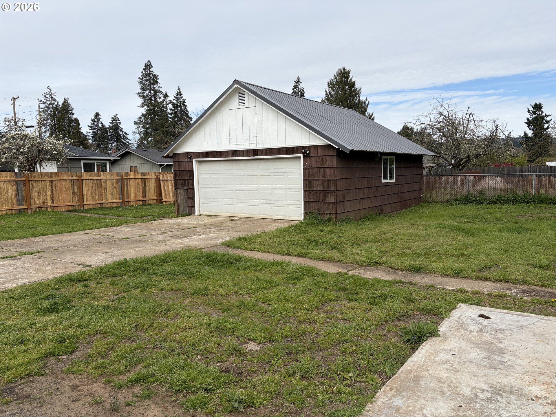 1st Street Cottage Grove, OR 97424 - Photo 1 of 3 a house view with a outdoor space
