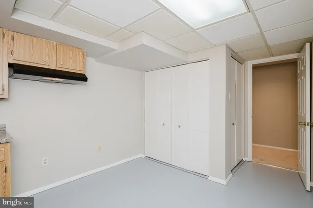 a view of a utility room with closet
