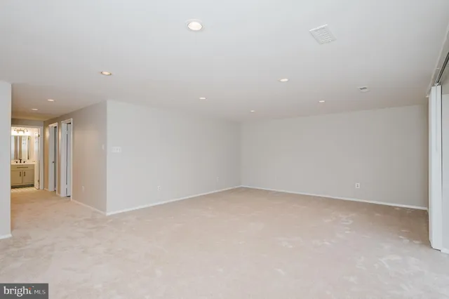a view of a balcony with wooden fence