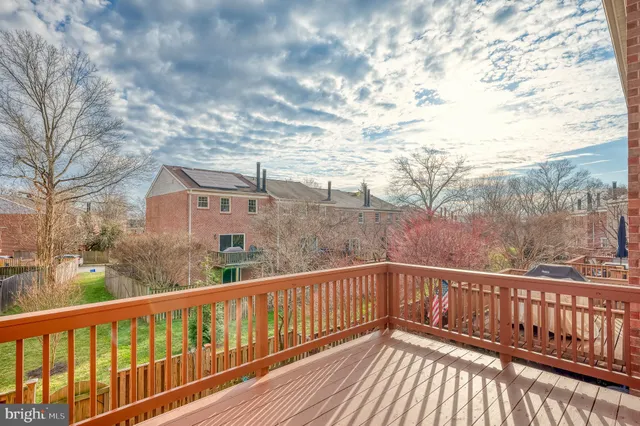 a view of a porch with wooden floor