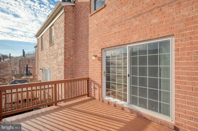 a view of a porch with a small yard