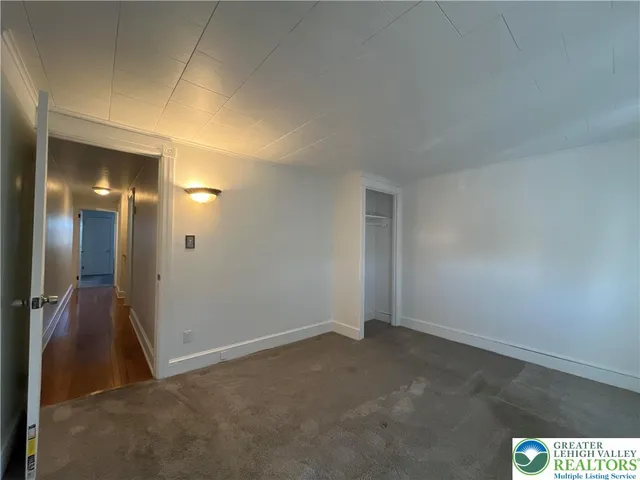 a bathroom with a toilet a sink and shower