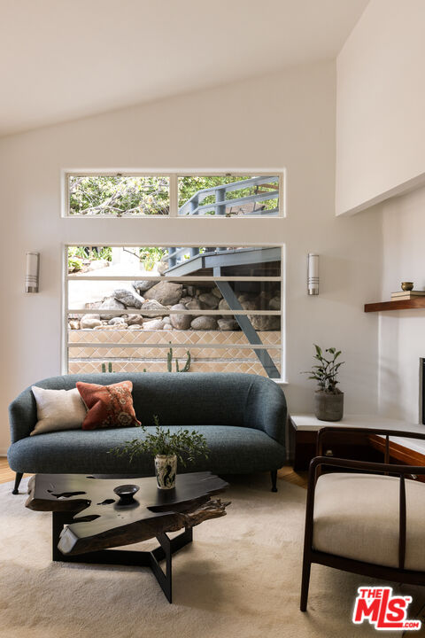 2510 Park Oak Drive Los Angeles, CA 90068 - Photo 11 of 38 a room with furniture and a window