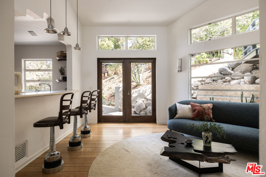2510 Park Oak Drive Los Angeles, CA 90068 - Photo 12 of 38 a living room with furniture and a large window