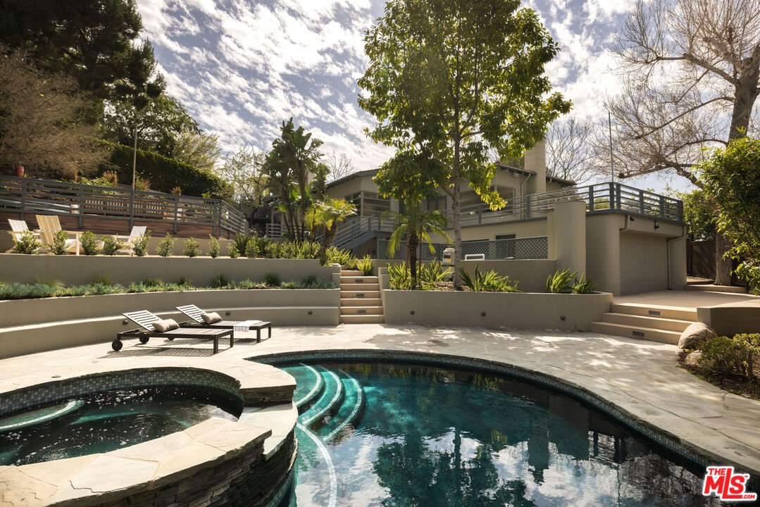 2510 Park Oak Drive Los Angeles, CA 90068 - Photo 15 of 38 a view of swimming pool with outdoor seating and plants