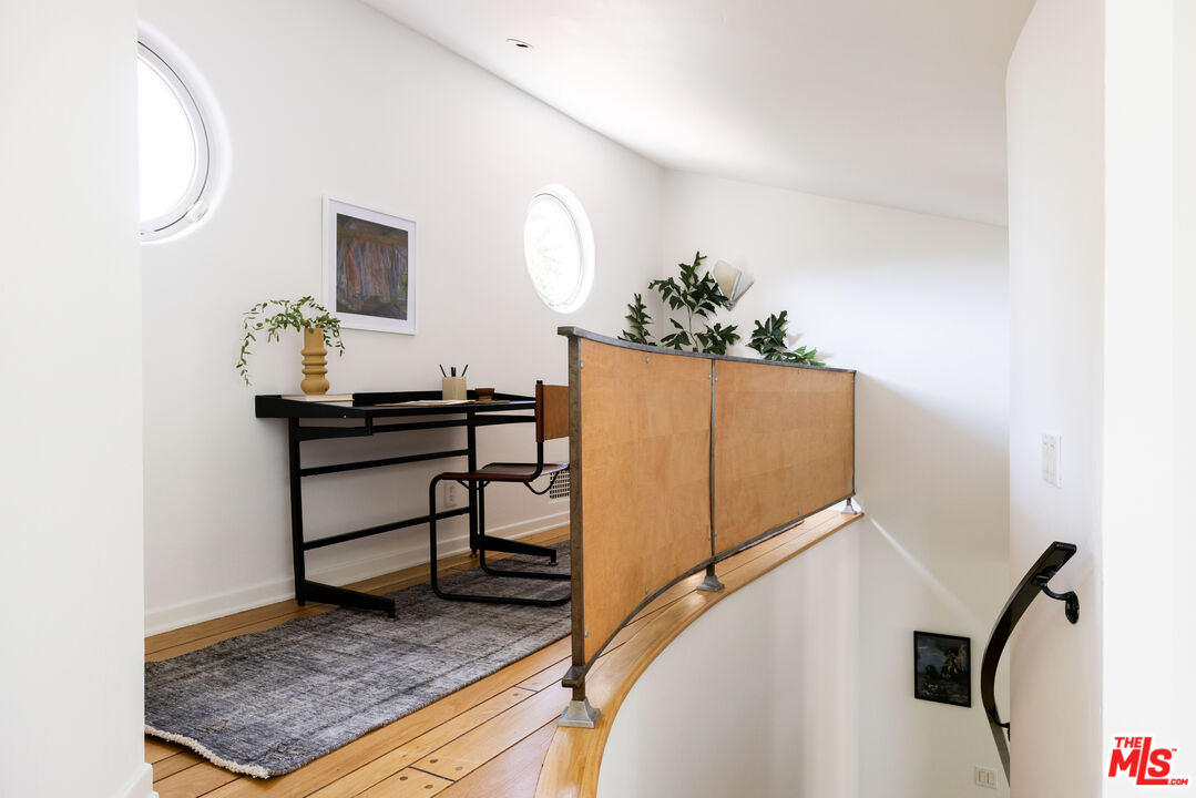 2510 Park Oak Drive Los Angeles, CA 90068 - Photo 17 of 38 a view of a hallway with seating area
