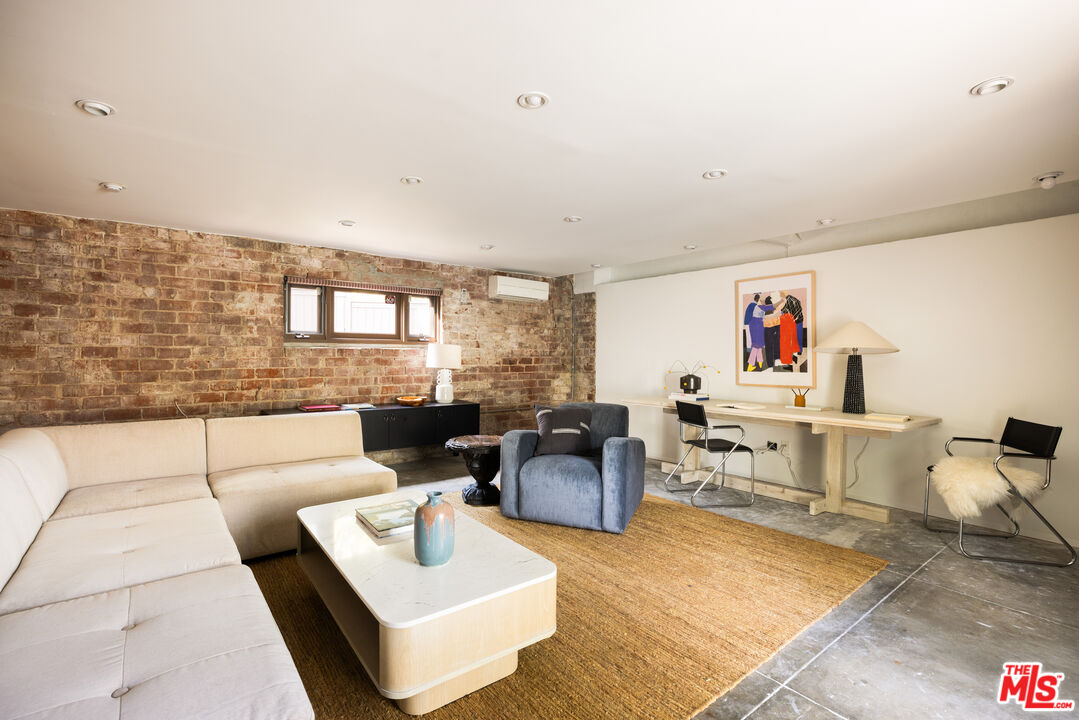 2510 Park Oak Drive Los Angeles, CA 90068 - Photo 29 of 38 a living room with furniture and a flat screen tv