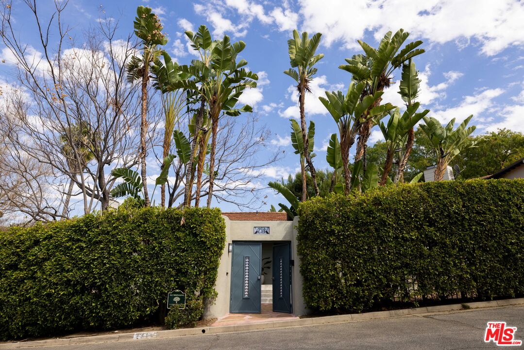 2510 Park Oak Drive Los Angeles, CA 90068 - Photo 32 of 38 a front view of a house with a tree