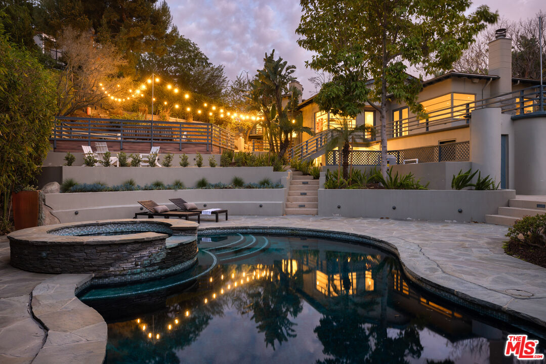 2510 Park Oak Drive Los Angeles, CA 90068 - Photo 35 of 38 a swimming pool with outdoor seating and yard