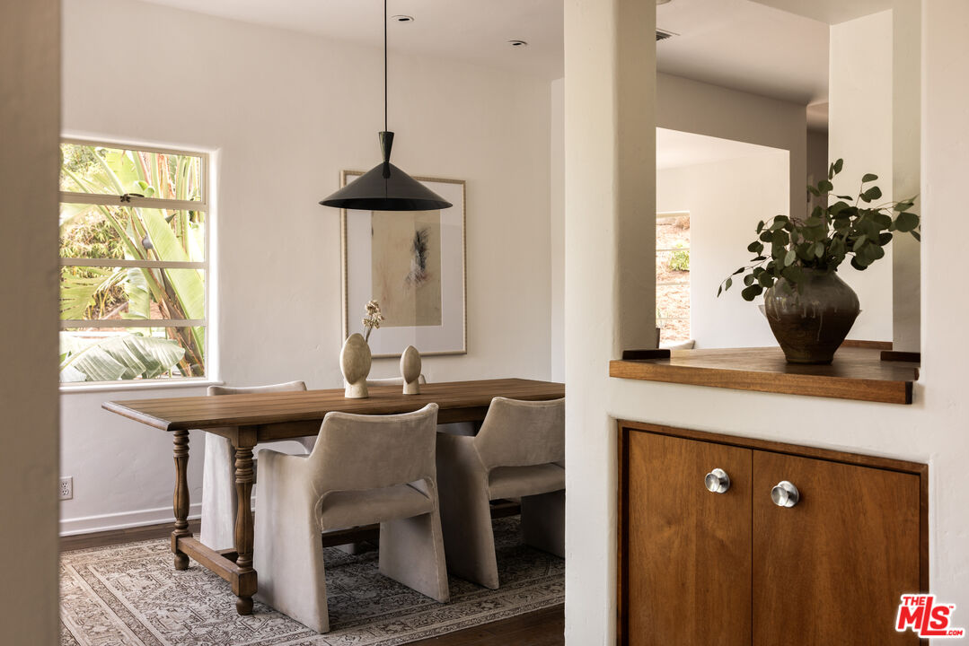 2510 Park Oak Drive Los Angeles, CA 90068 - Photo 5 of 38 a view of a room with a table and chairs