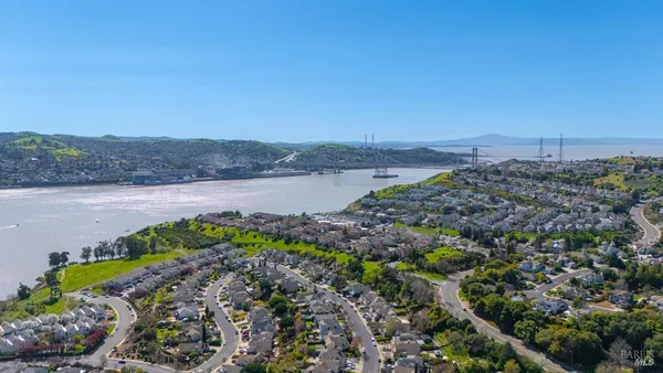 an aerial view of a town with couple of houses