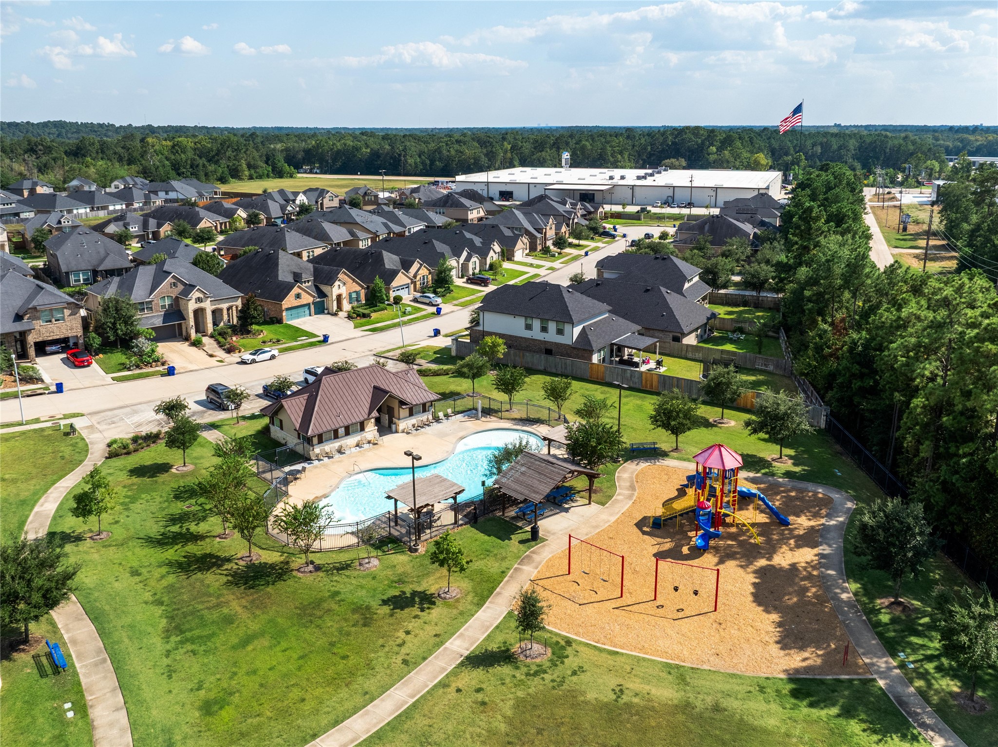 214 Pleasant Hill Way Conroe, TX 77304 - Photo 33 of 43 Hills of Westlake is a great place to call home with a central location along SH 105 that is close to shopping, dining, & conveniences like a gas station just before the neighborhood entrance for last minute "I need gas" stops.
