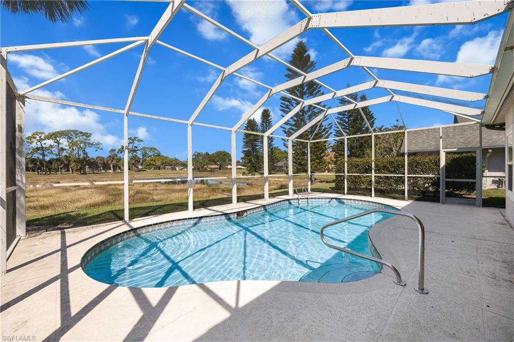 867 St Andrews Boulevard Naples, FL 34113 - Photo 26 of 28 a view of a indoor swimming pool