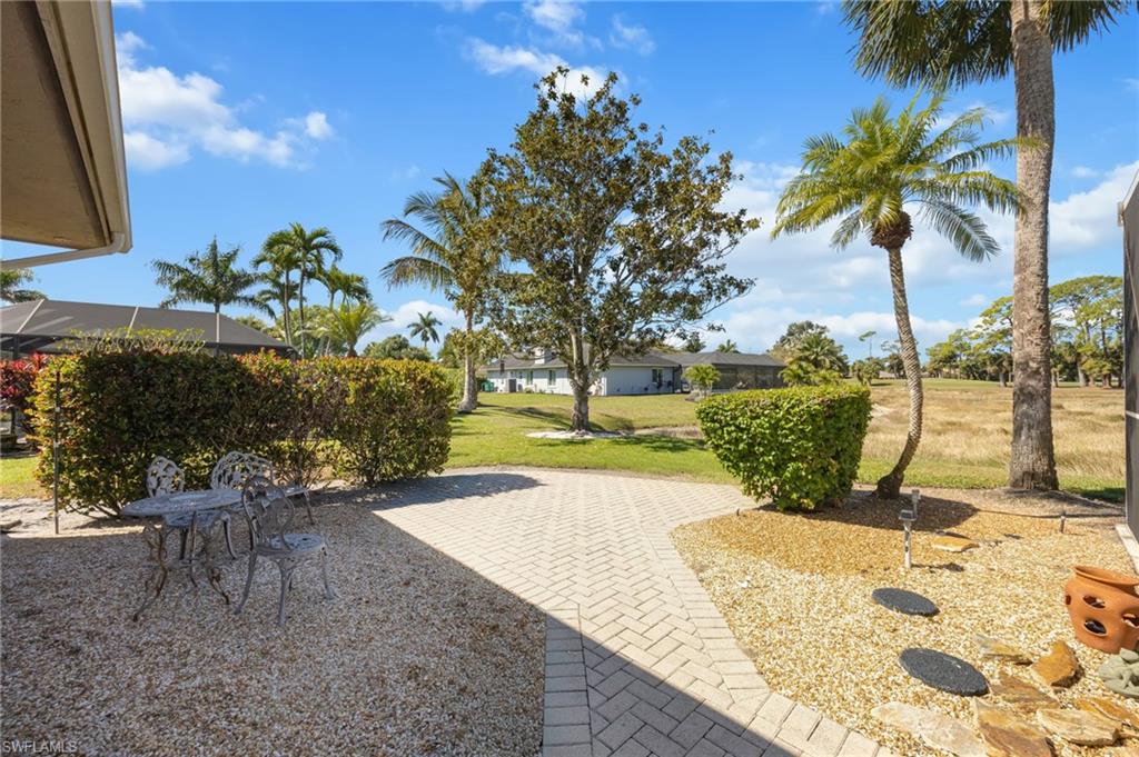 867 St Andrews Boulevard Naples, FL 34113 - Photo 27 of 28 a view of a backyard