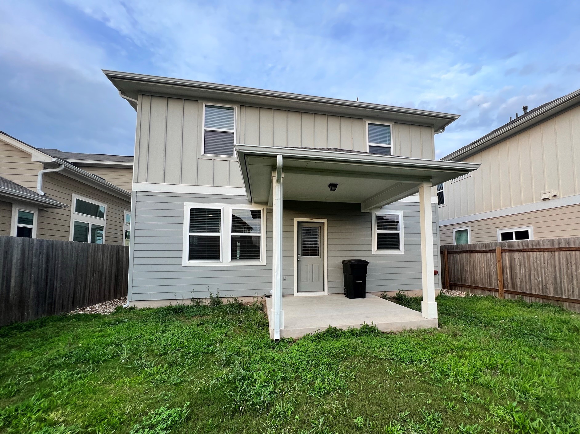 6413 Owl Creek Lane Austin, TX 78747 - Photo 14 of 23 a front view of a house with a yard
