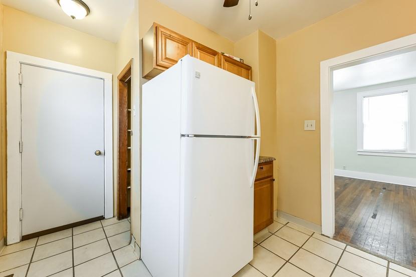 6472 Monitor Street Pittsburgh, PA 15217 - Photo 12 of 39 a view of a storage & utility room with wooden floor